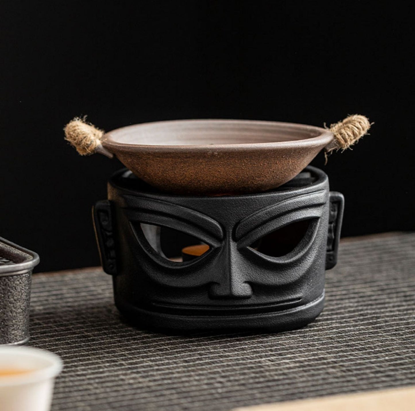 This is a pottery scoop warmer set