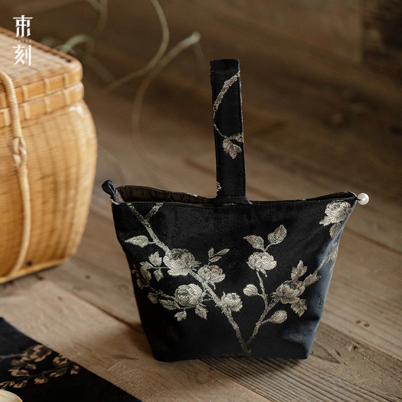 This is a brocade storage bag. this is a cloth tea bag