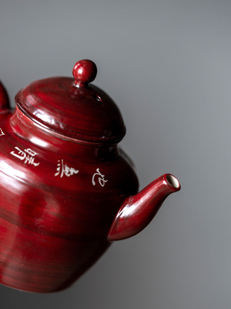 This is a pottery teapot