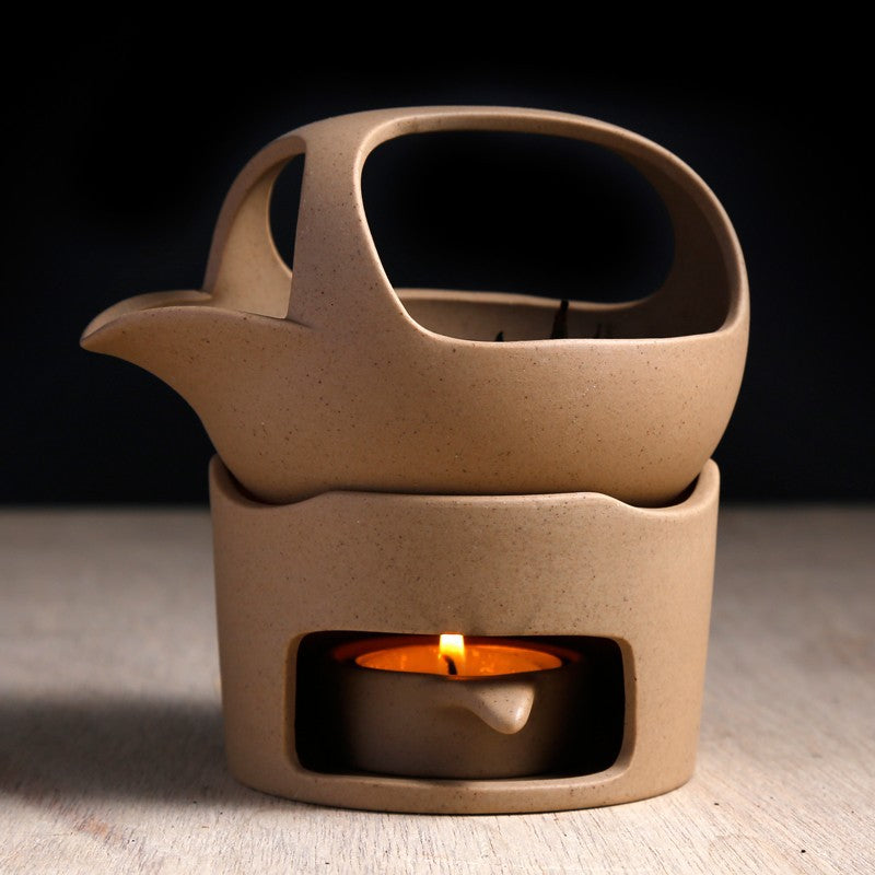 This is a ceramic scoop warmer set