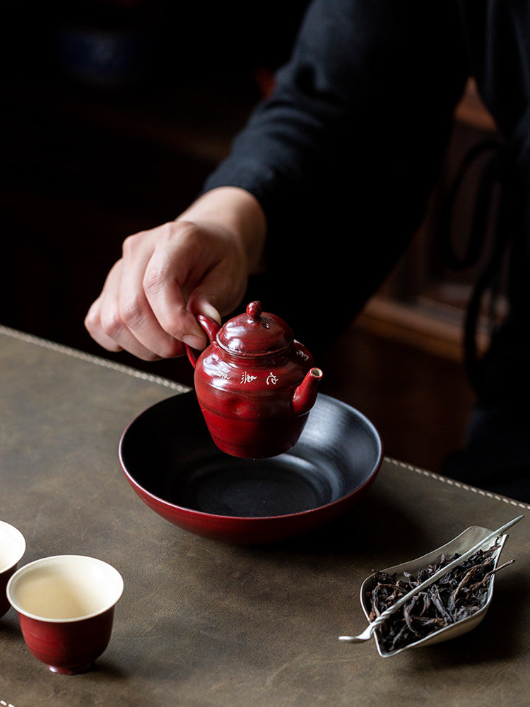 This is a pottery teapot