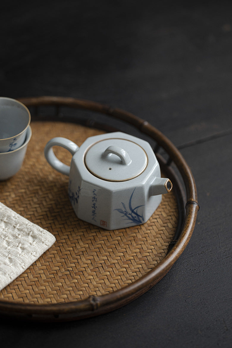 This is a ceramic teapot