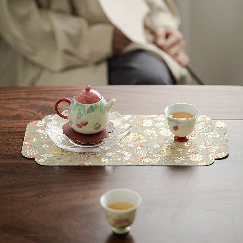 This is a silk brocade chaxi tea mat. this is a waterproof table cloth