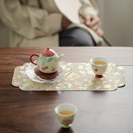This is a silk brocade chaxi tea mat. this is a waterproof table cloth