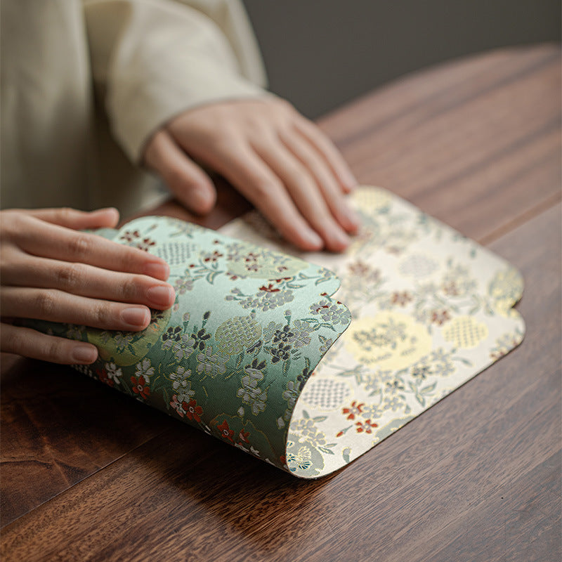 This is a silk brocade chaxi tea mat. this is a waterproof table cloth