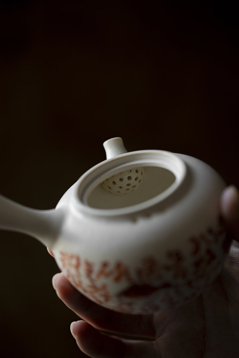 This is a soda glaze teapot