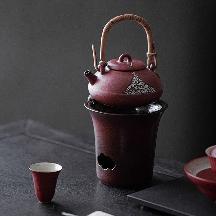 This is a pottery lifting handle kettle