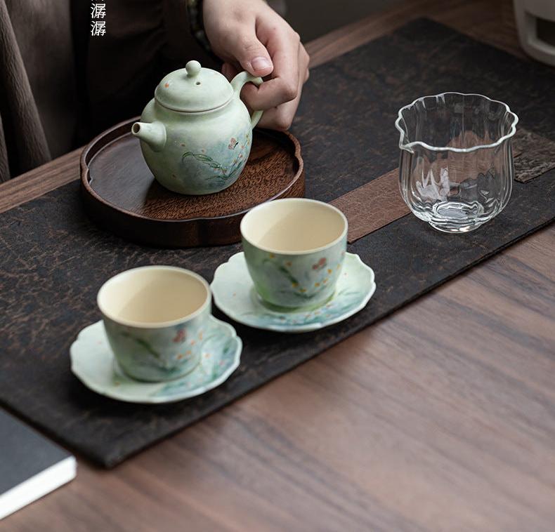 this is a ceramic teapot