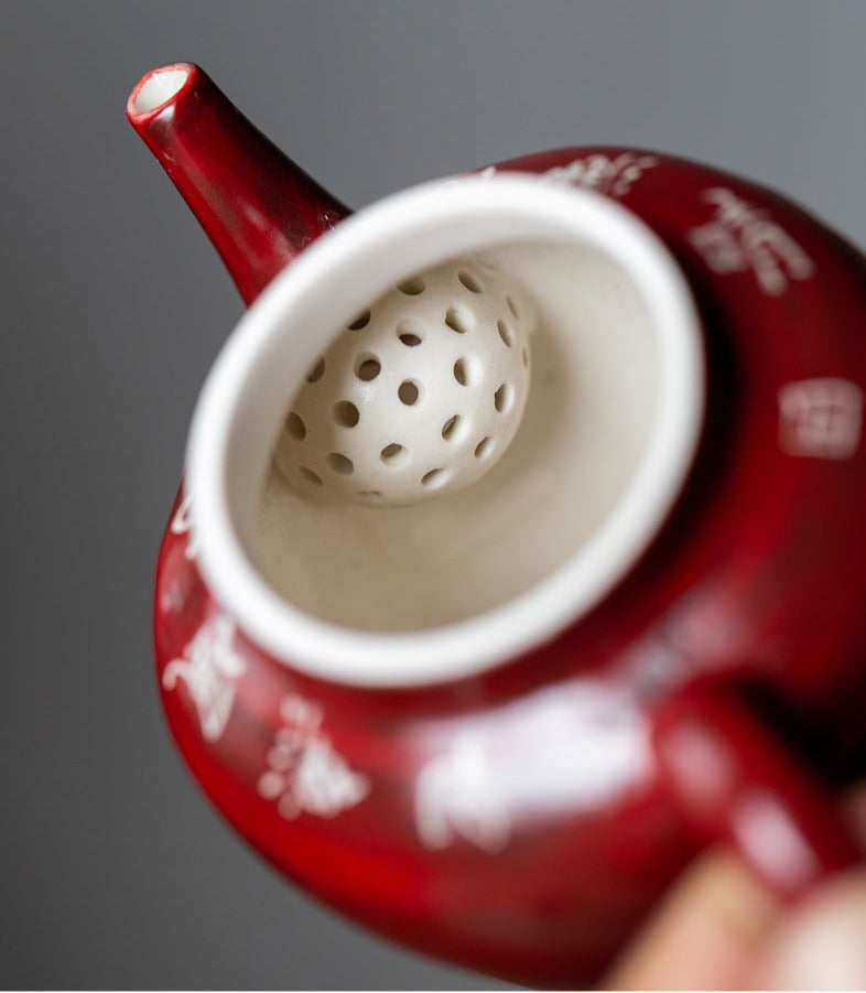 This is a pottery teapot