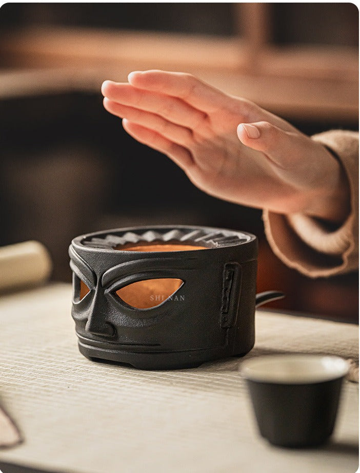 This is a pottery scoop warmer set