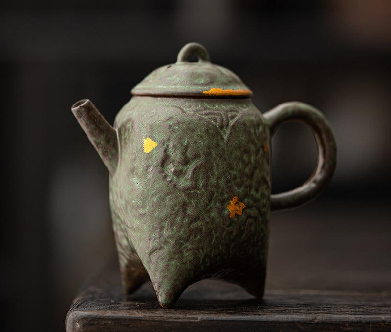 this is a crude pottery teapot