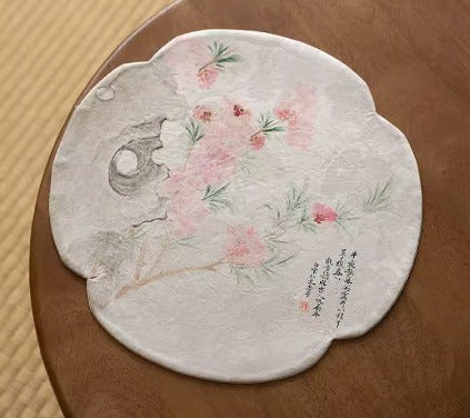 This is a silk brocade tea mat.this is a waterproof table cloth