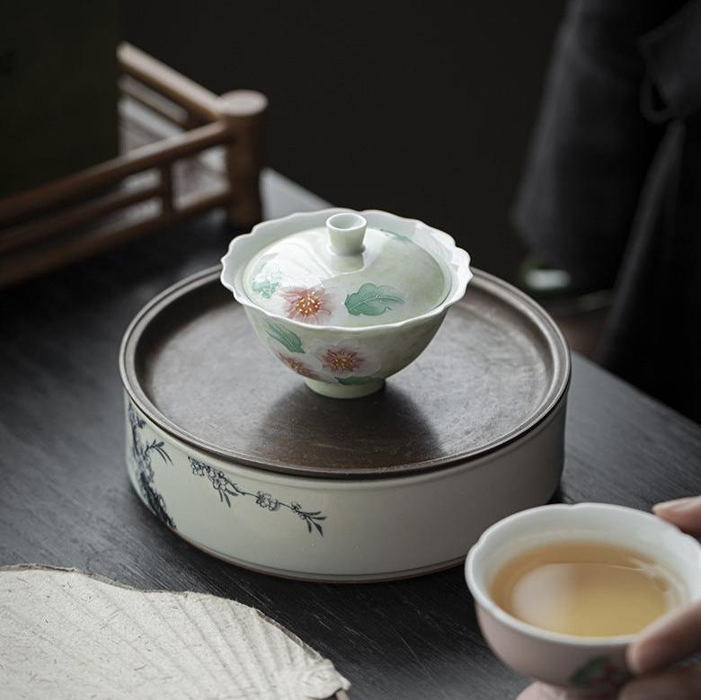 This is a Arita ware teapot. this is a ceramic gaiwan