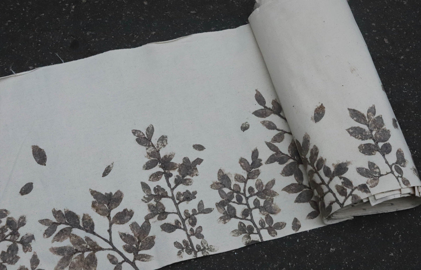 This is a plant-dyed tea mat table cloth