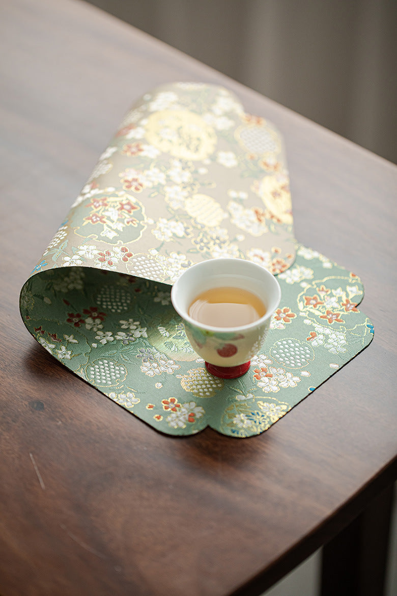 This is a silk brocade chaxi tea mat. this is a waterproof table cloth