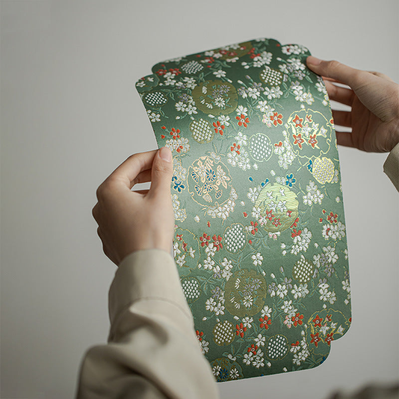 This is a silk brocade chaxi tea mat. this is a waterproof table cloth