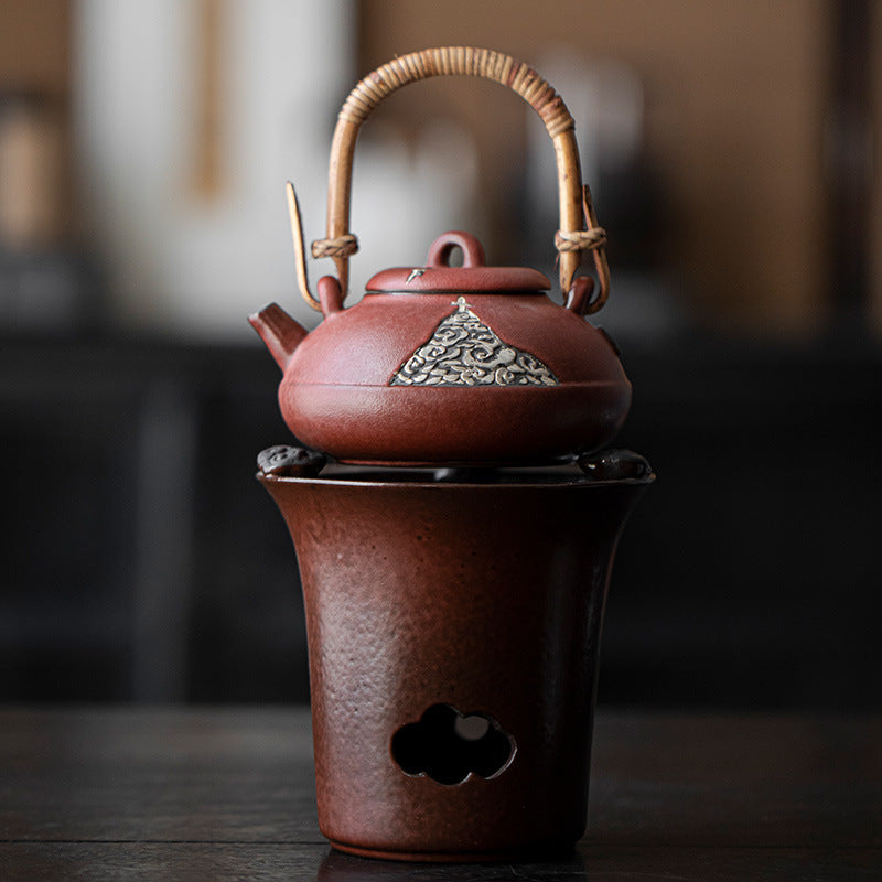 This is a pottery lifting handle kettle