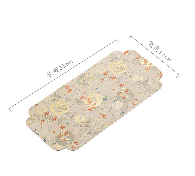 This is a silk brocade chaxi tea mat. this is a waterproof table cloth