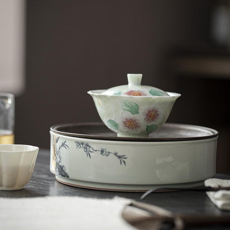 This is a Arita ware teapot. this is a ceramic gaiwan