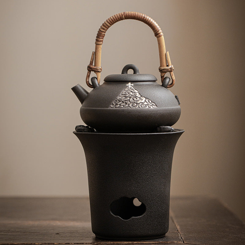 This is a pottery lifting handle kettle