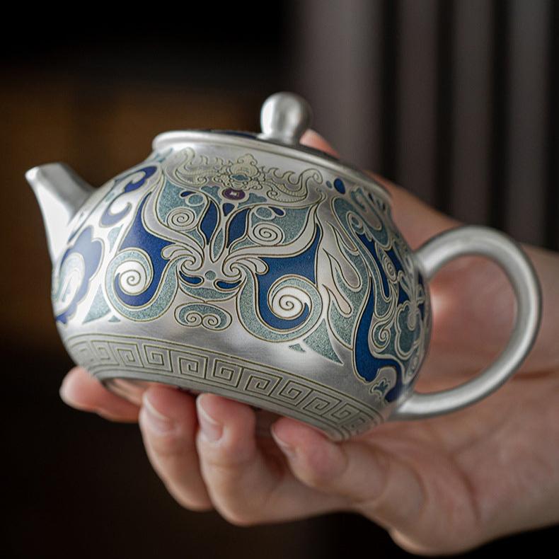 This is a gilded silver teapot. This is a ceramic teapot