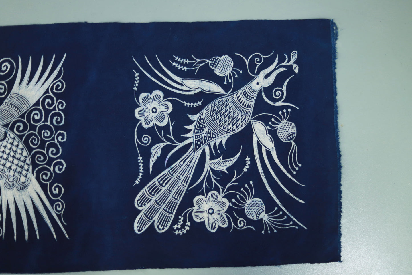 This is a Chinese Miao style batik table cloth tea mat