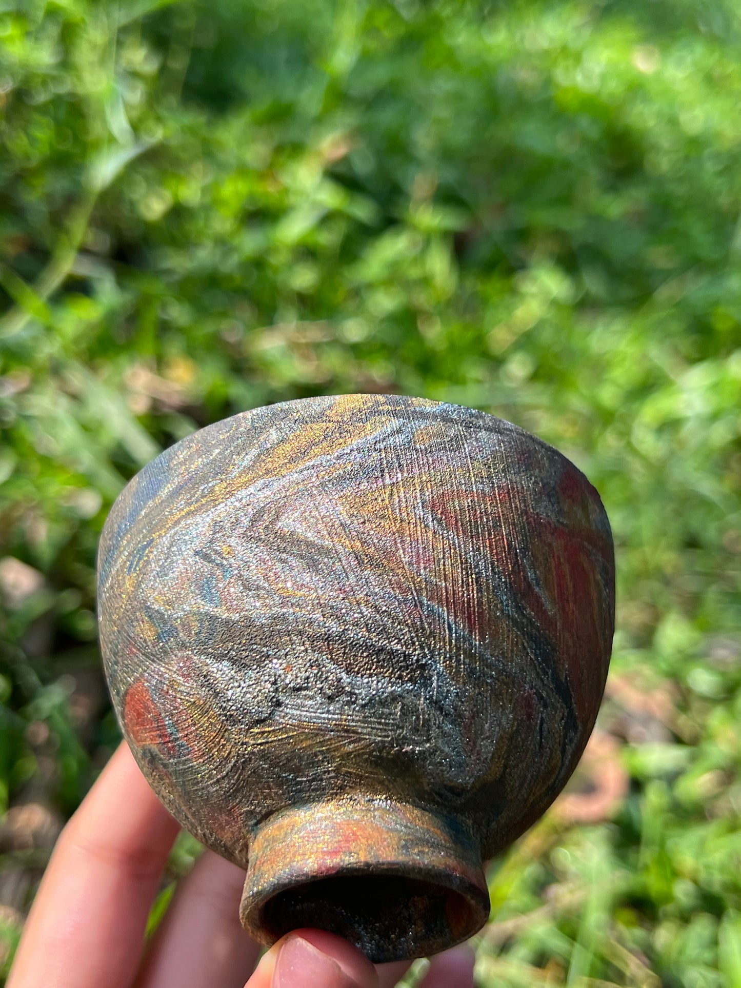 this is Chinese lacquer ware. this is a pottery teacup