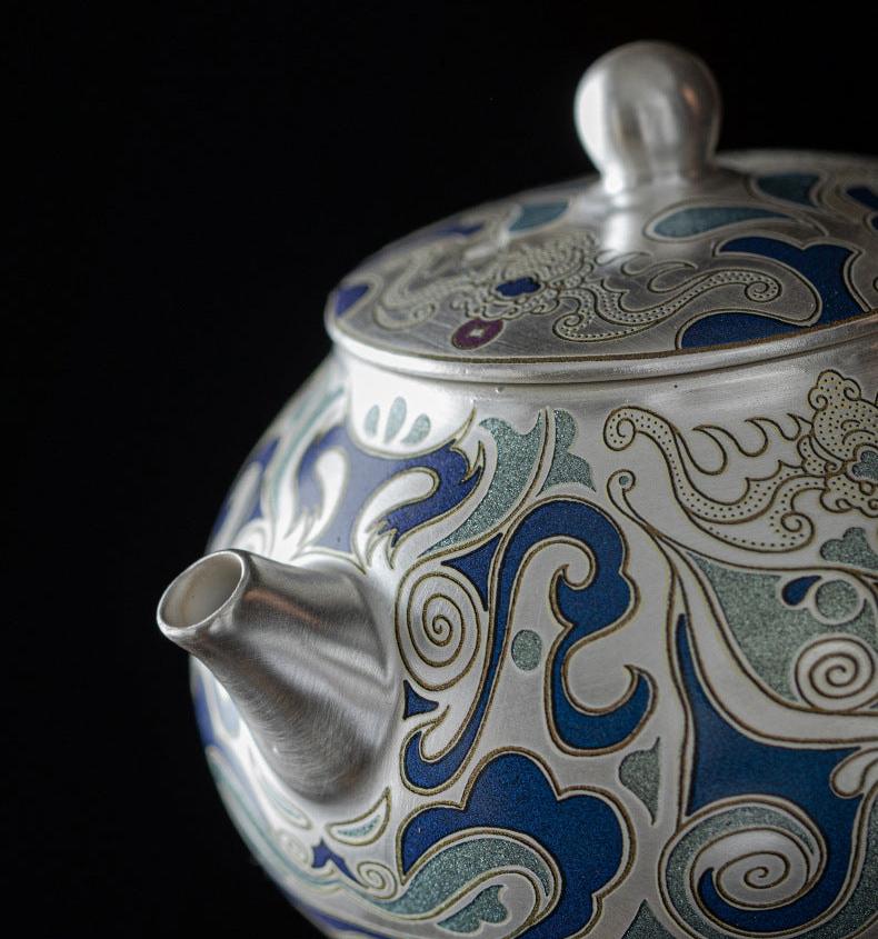 This is a gilded silver teapot. This is a ceramic teapot