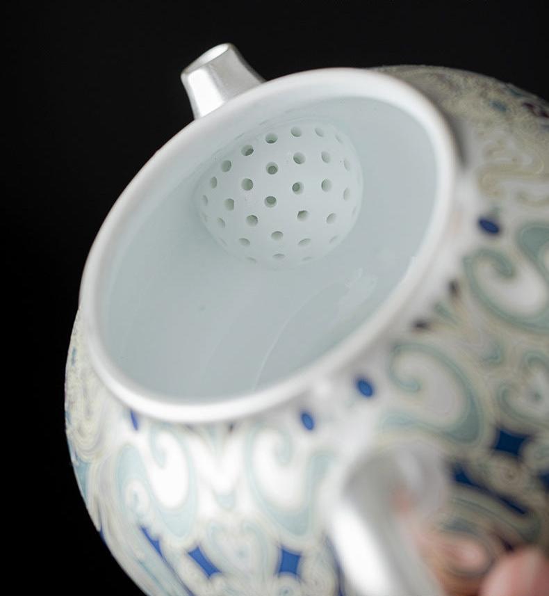 This is a gilded silver teapot. This is a ceramic teapot