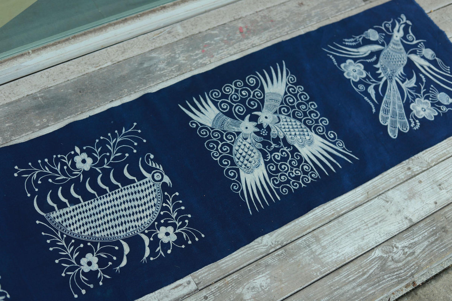 This is a Chinese Miao style batik table cloth tea mat
