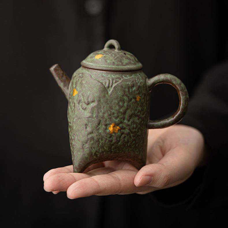 this is a crude pottery teapot