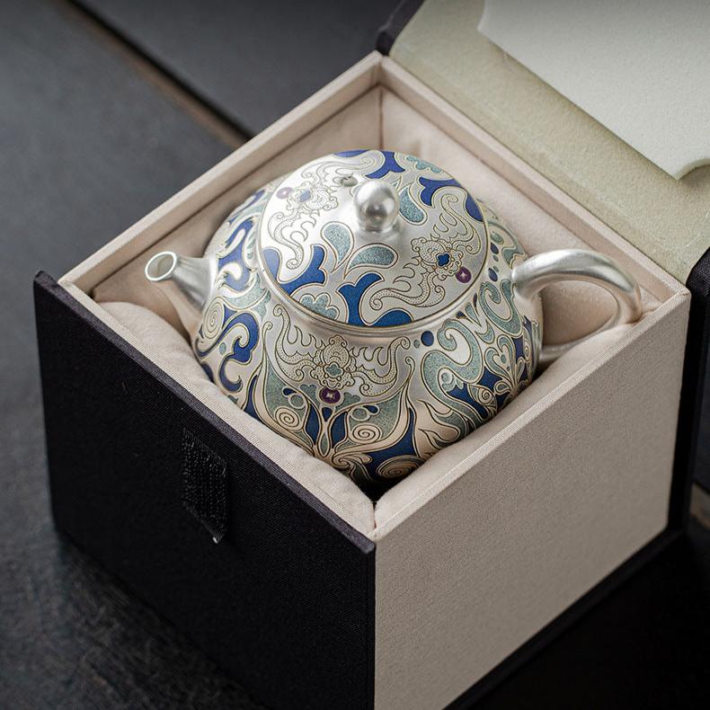 This is a gilded silver teapot. This is a ceramic teapot