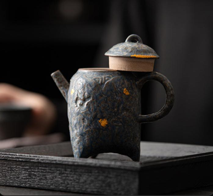 this is a crude pottery teapot