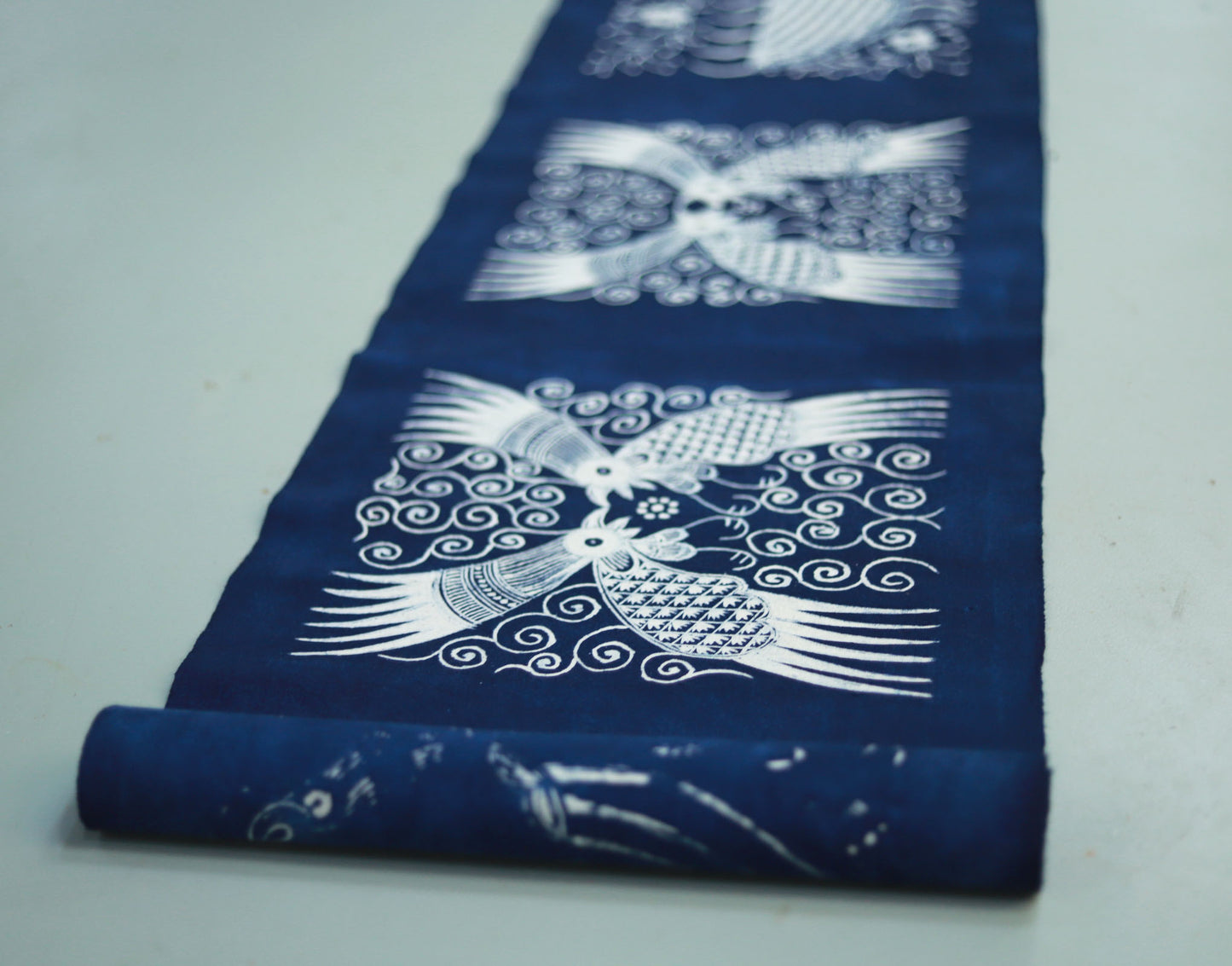 This is a Chinese Miao style batik table cloth tea mat