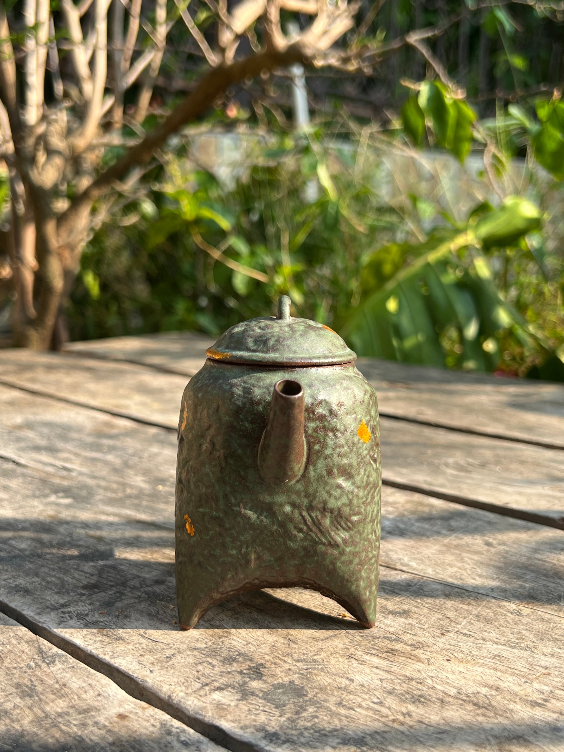 this is a crude pottery teapot