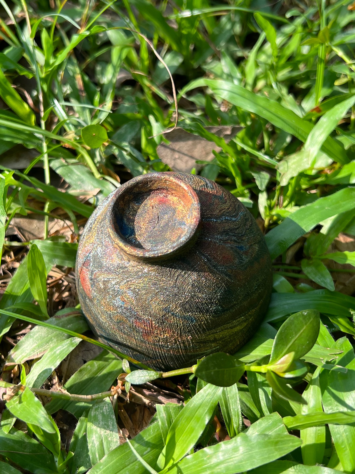 this is Chinese lacquer ware. this is a pottery teacup