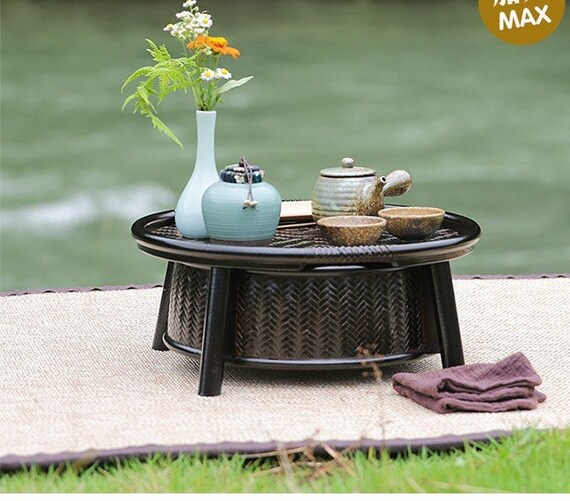 This is a bamboo weaving storage tea table.this is a black tea table
