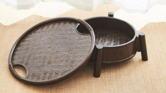 This is a bamboo weaving storage tea table.this is a black tea table