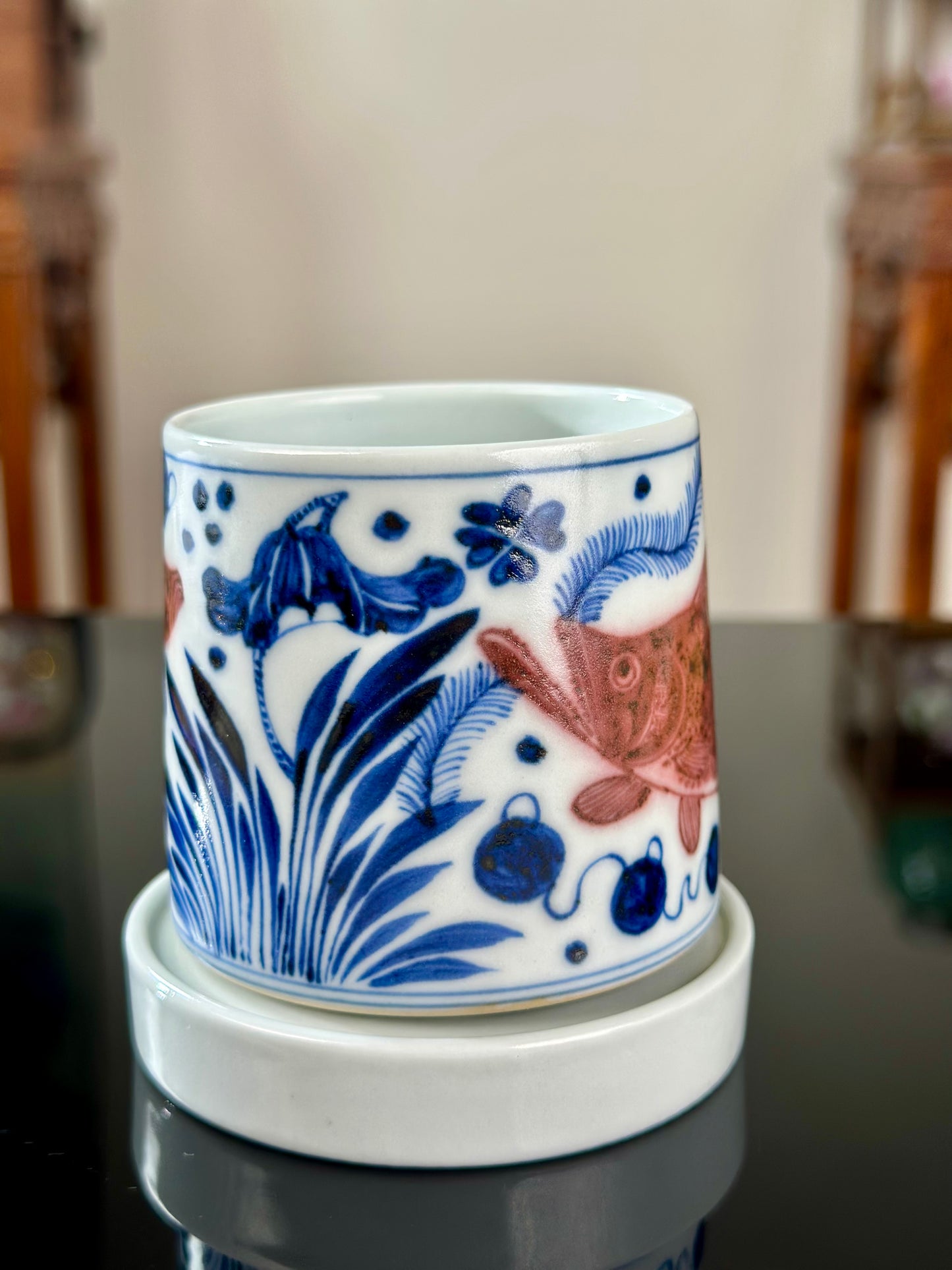 Handpainted Chinese Traditional Gui Fish Pattern Blue and White Underglaze Red Youlihong Porcelain Jingdezhen Rotating Teacup