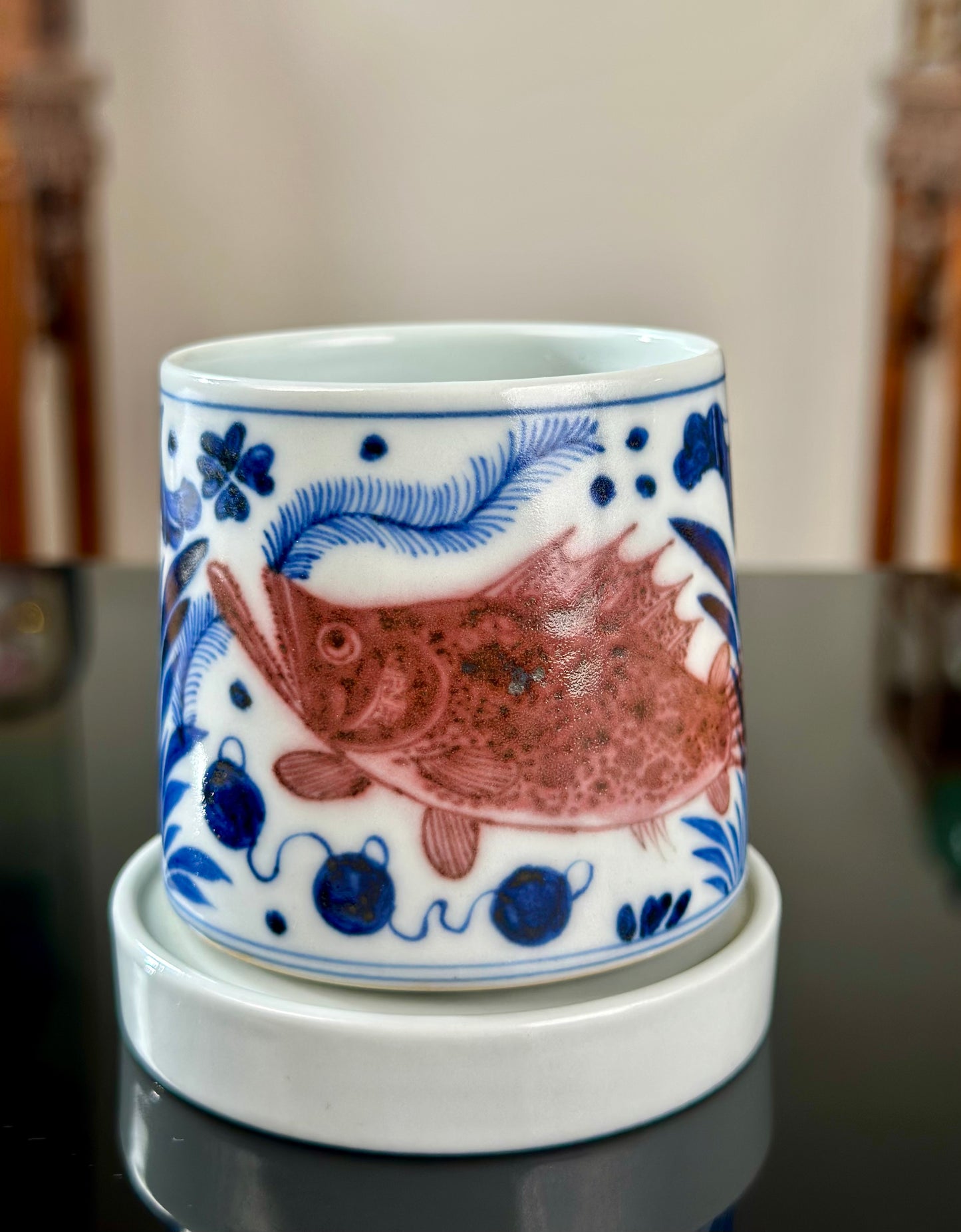 Handpainted Chinese Traditional Gui Fish Pattern Blue and White Underglaze Red Youlihong Porcelain Jingdezhen Rotating Teacup