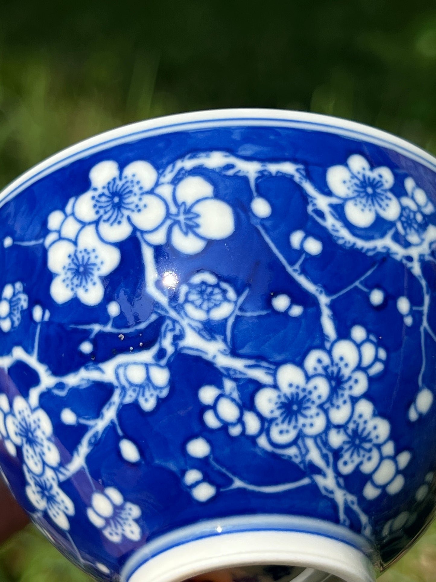 This is Chinese Jingdezhen blue and white porcelain gaiwan. This is a ceramic plum flower teapot