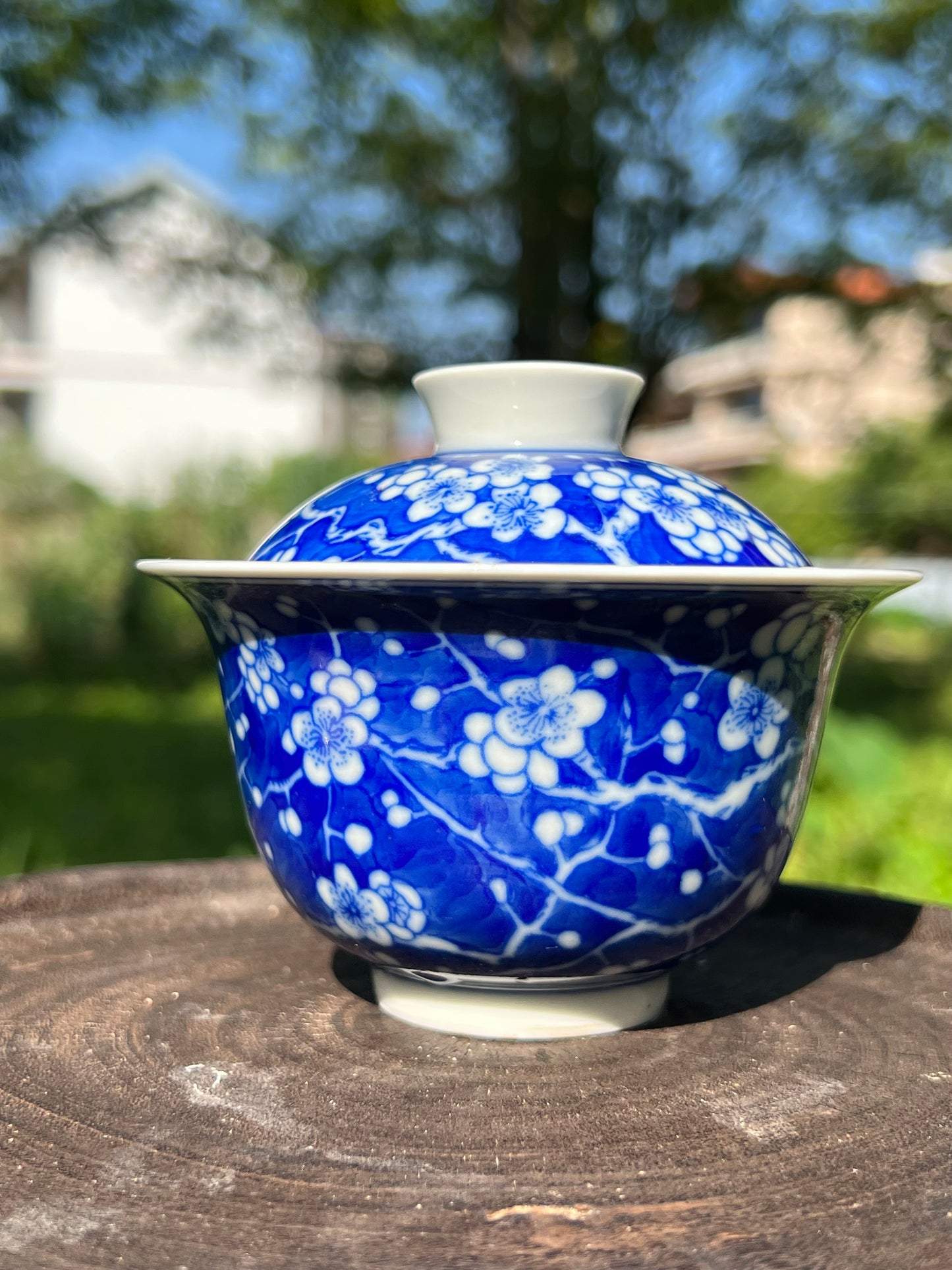 This is Chinese Jingdezhen blue and white porcelain gaiwan. This is a ceramic plum flower teapot
