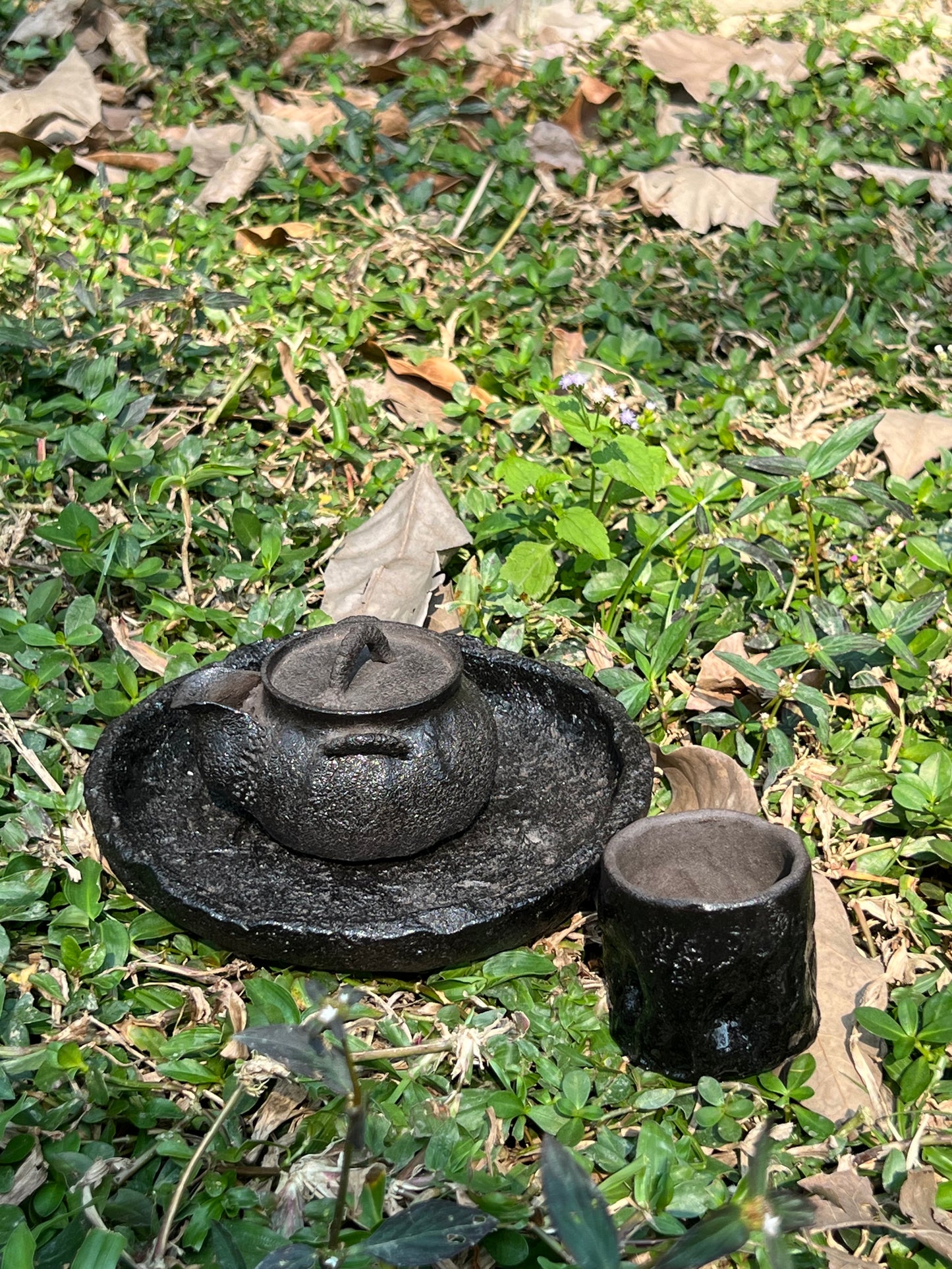 This is a purple clay teapot