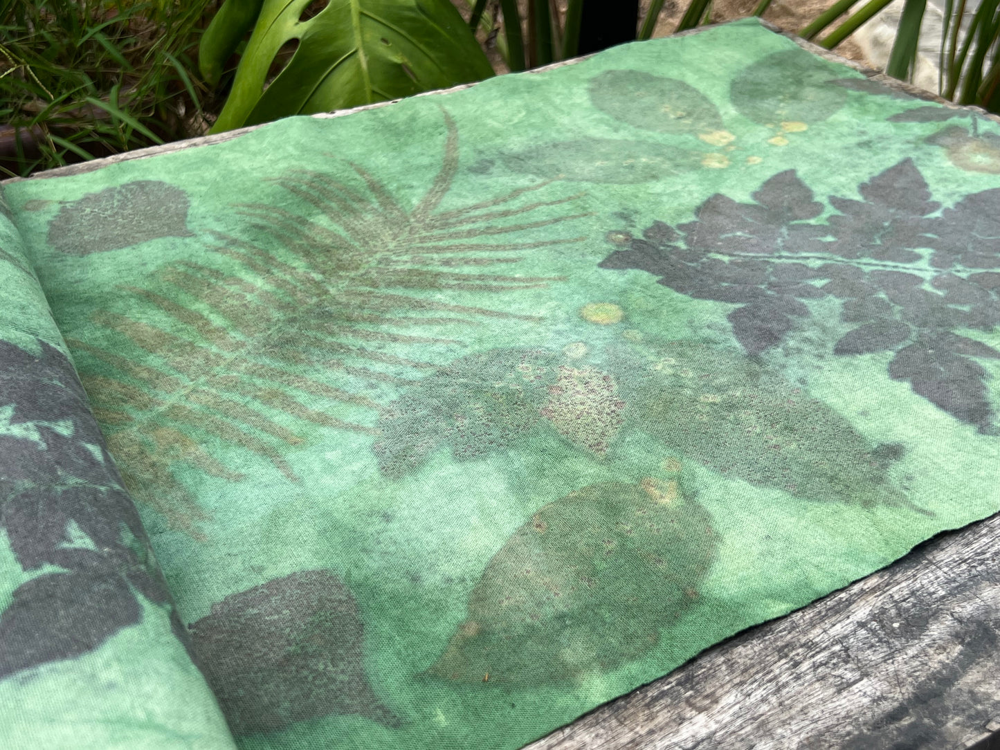 This is a plant dyed tea mat table cloth