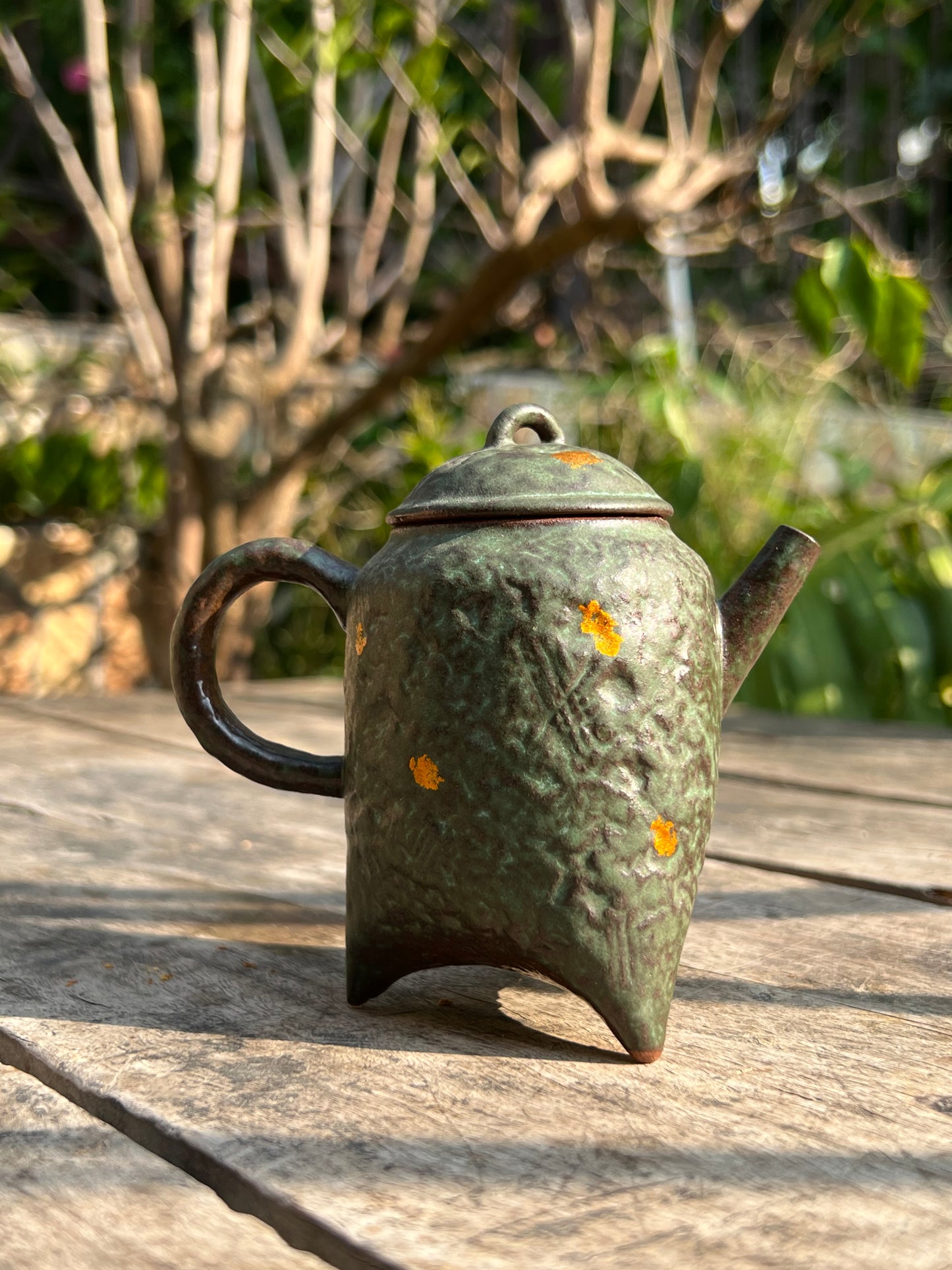 this is a crude pottery teapot