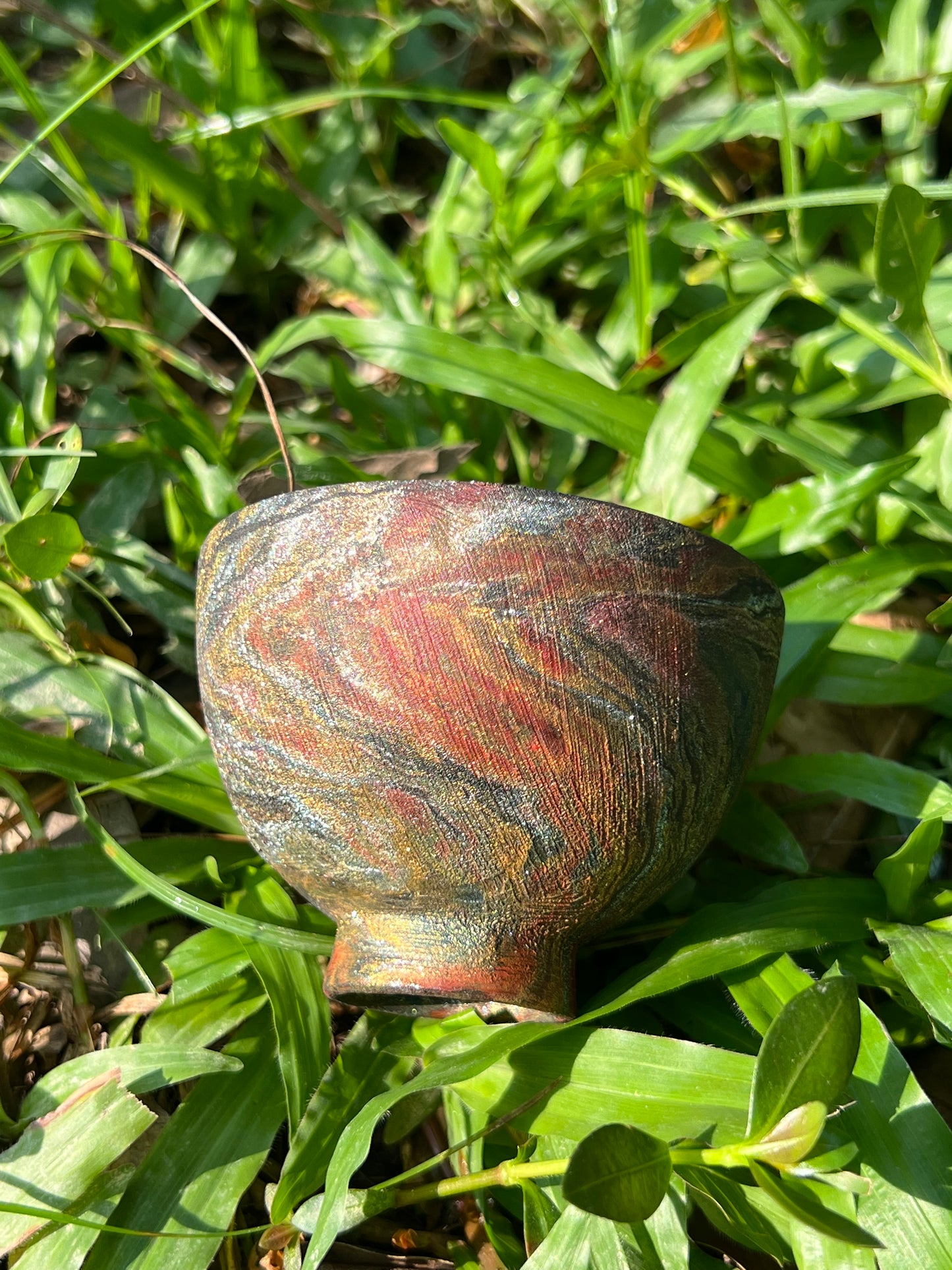 this is Chinese lacquer ware. this is a pottery teacup
