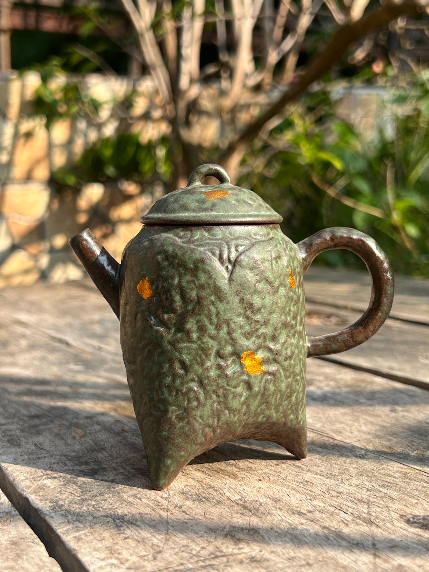 this is a crude pottery teapot