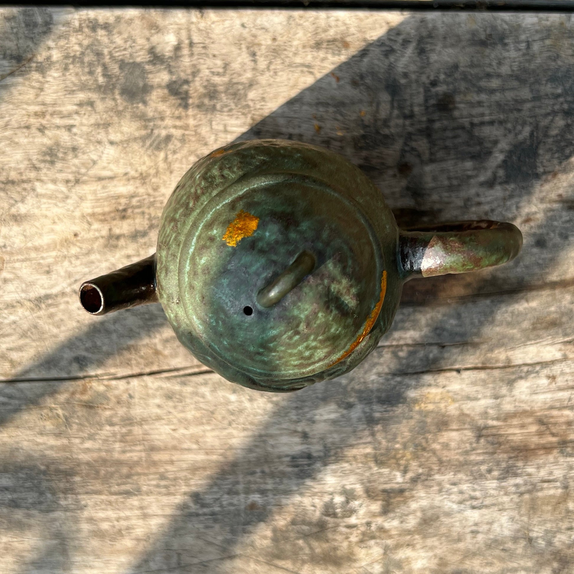 this is a crude pottery teapot