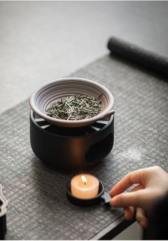 This is a pottery scoop warmer set