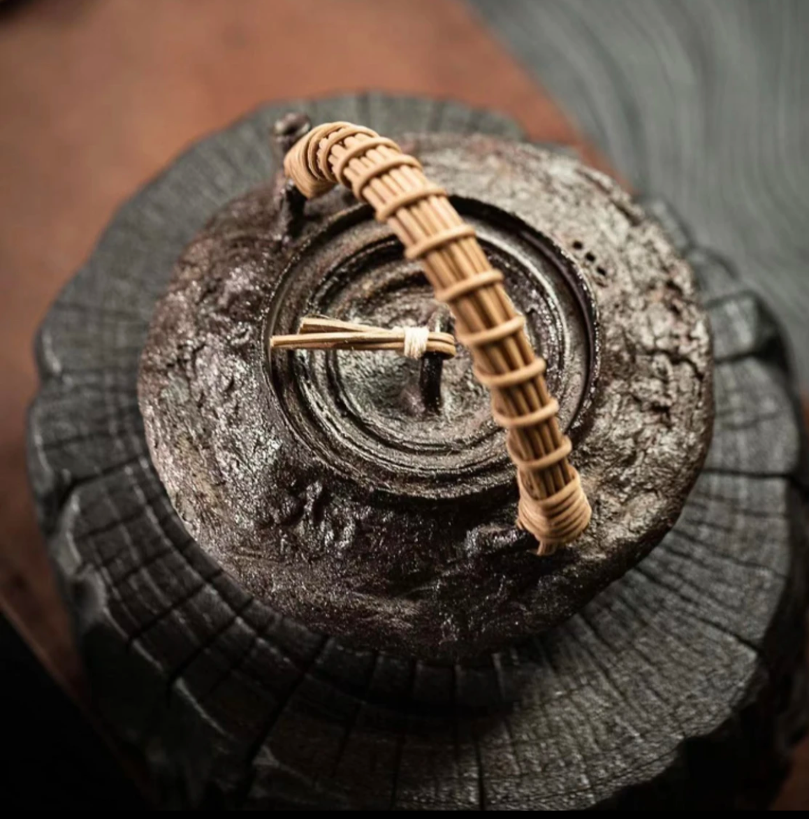 This is a pottery lifting handle kettle